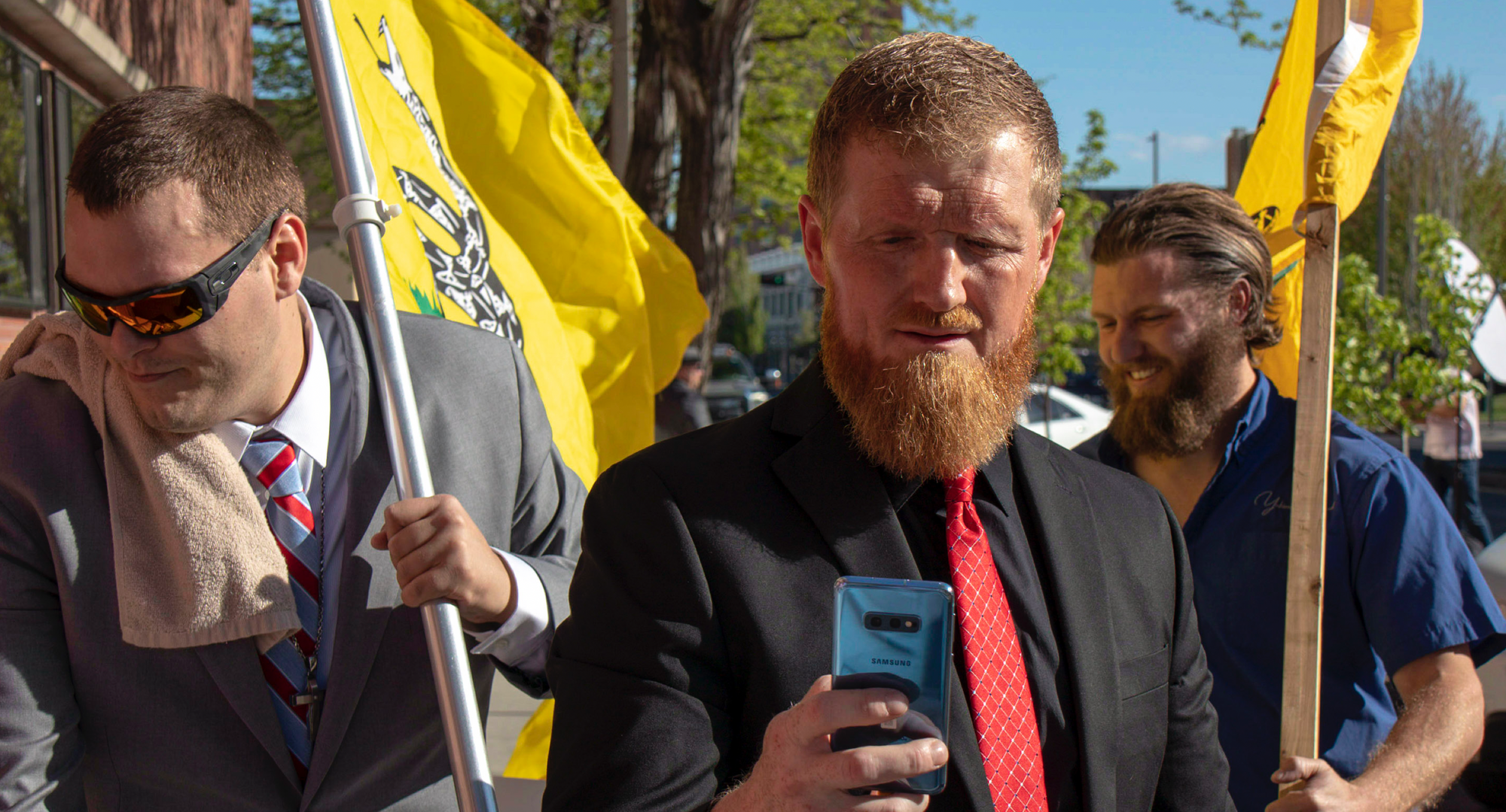 Jason White and Kenton Gartrell protesting censure with "Don't Tread on Me" flags