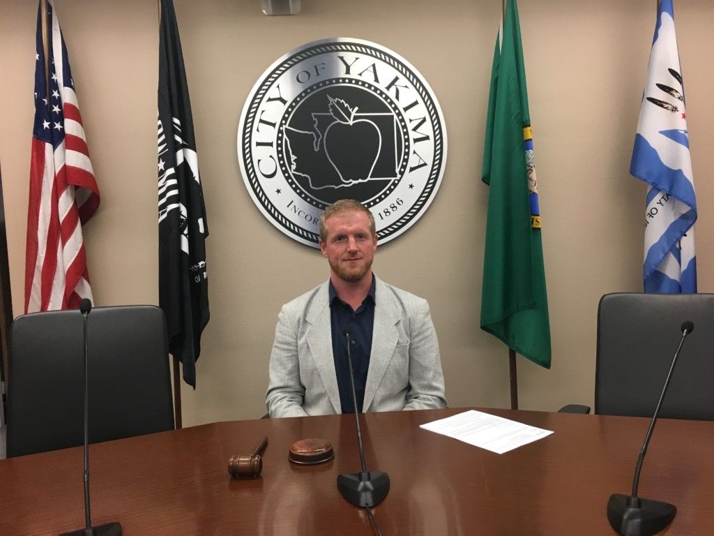 Jason White protesting COVID-19 alone at Yakima City Hall.